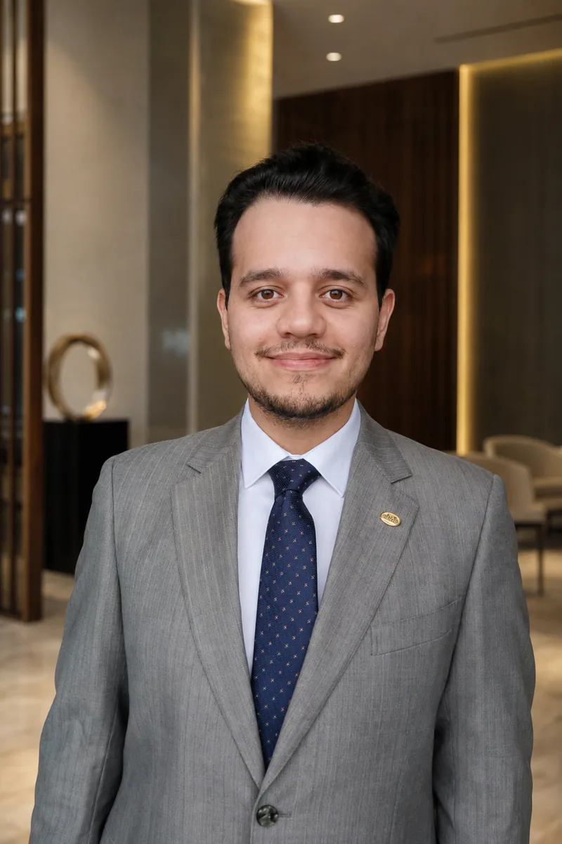 Omid Aslani Damirchi in his original white clinical coat photograph